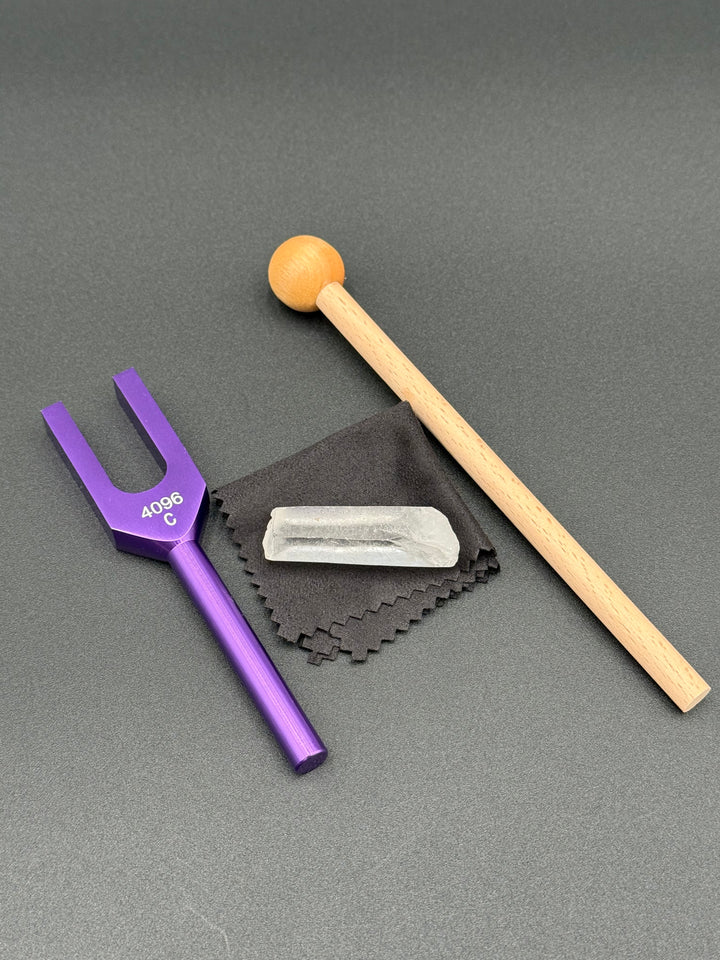 4096 Hz tuning fork with clear quartz crystal and striker for sound healing and energy cleansing
