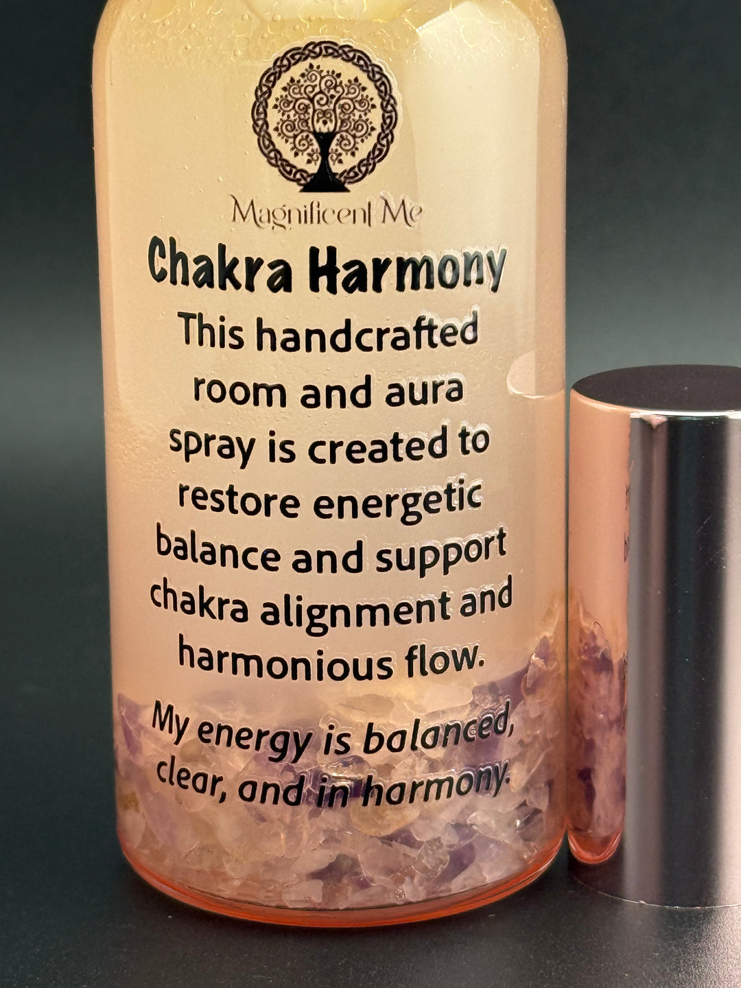 Close-up of Chakra Harmony Room & Aura Spray by Magnificent Me featuring crystal infusion and an affirmation for chakra alignment, energetic balance, and harmony.