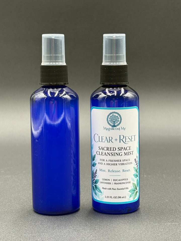 Three Magnificent Me Clear + Reset Sacred Space Cleansing Mist bottles with lemon, eucalyptus, lavender and frankincense essential oils in blue 3.33 oz spray bottles.