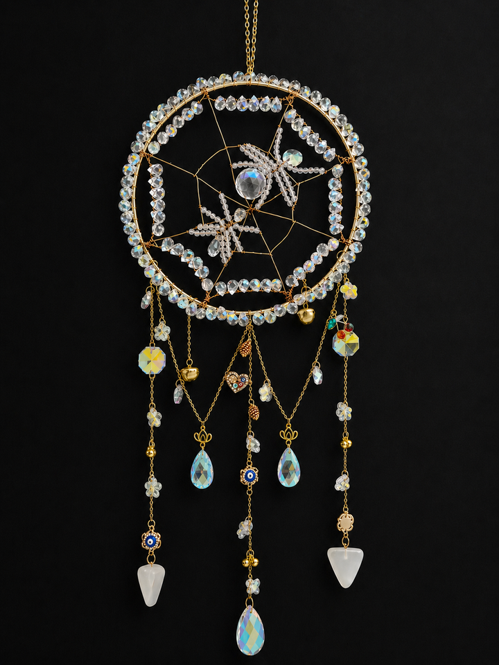 crystal spider sun catcher with black drop with gold charms and copper wire