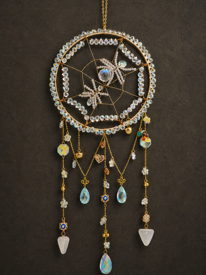 Ethereal spider crystal sun catcher with evil eye charms and gold frame and copper wire