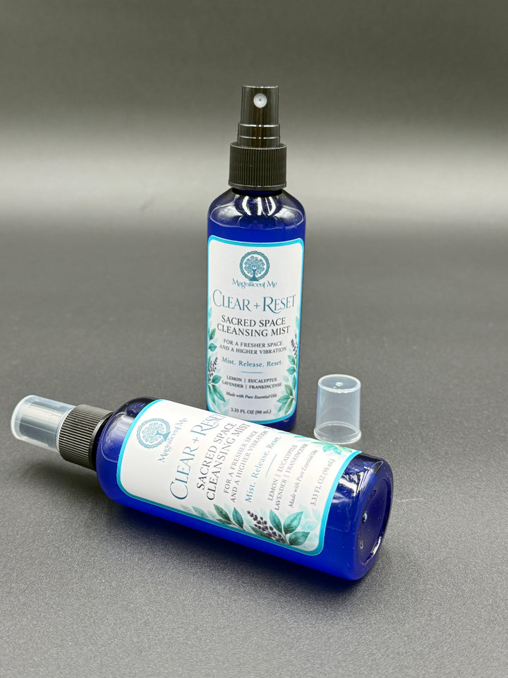 Magnificent Me Clear + Reset essential oil room spray displayed in a serene home setting as part of a mindful space-refreshing ritual.