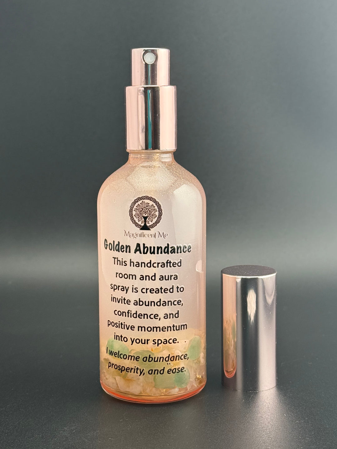 Golden Abundance crystal-infused room and aura spray surrounded by healing crystals to support abundance, prosperity, and positive energy.