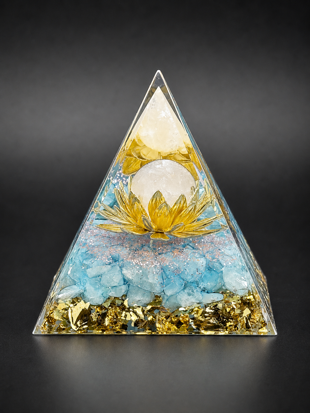 Aquamarine orgone pyramid with lotus flower for calm energy, clarity, and emotional balance