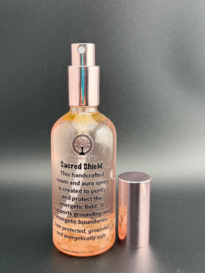 Sacred Shield crystal-infused room and aura spray surrounded by healing crystals for energetic cleansing, grounding, and spiritual protection.
