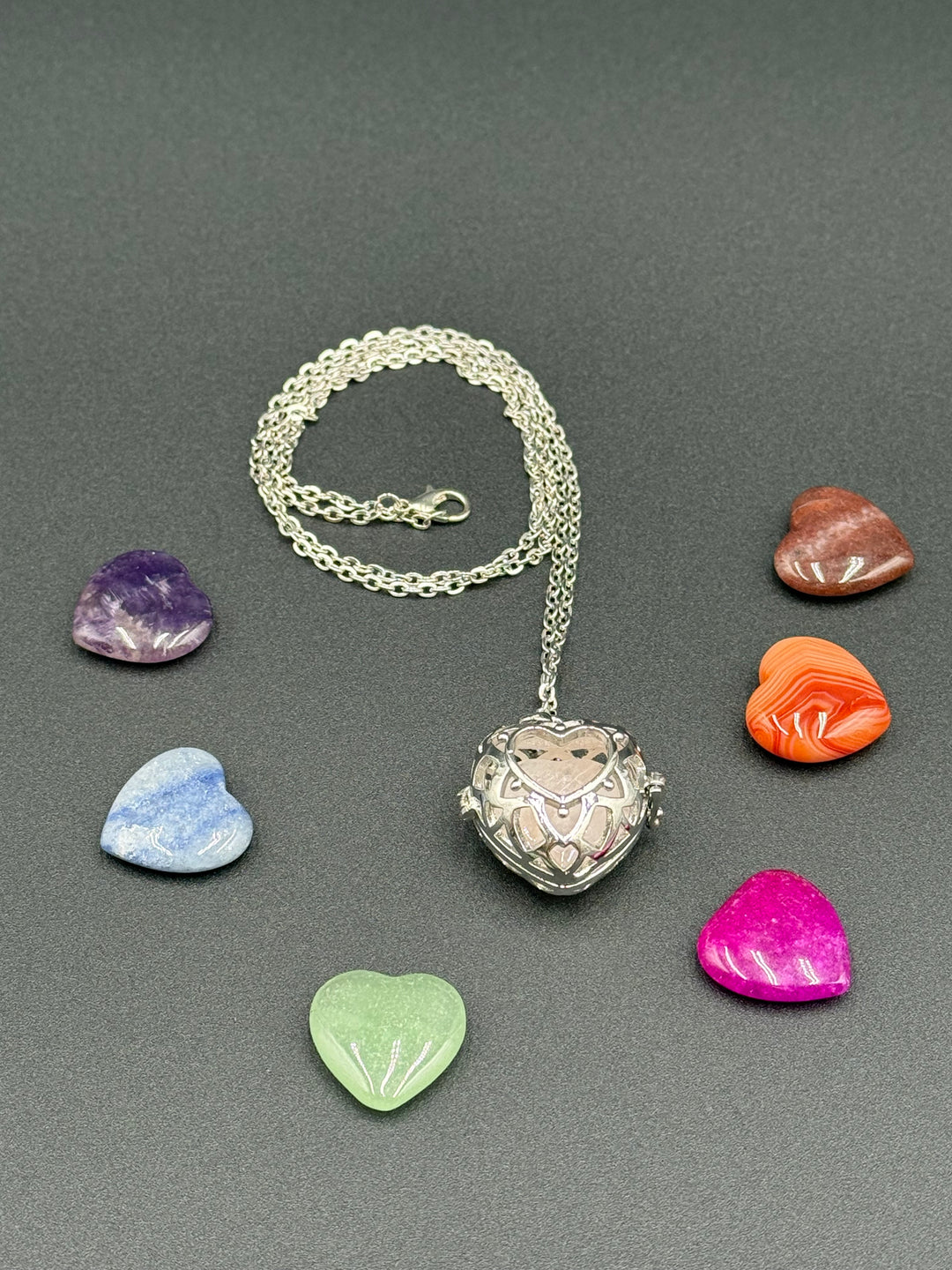 Silver heart necklace with seven chakra crystal heart stones for balance and healing